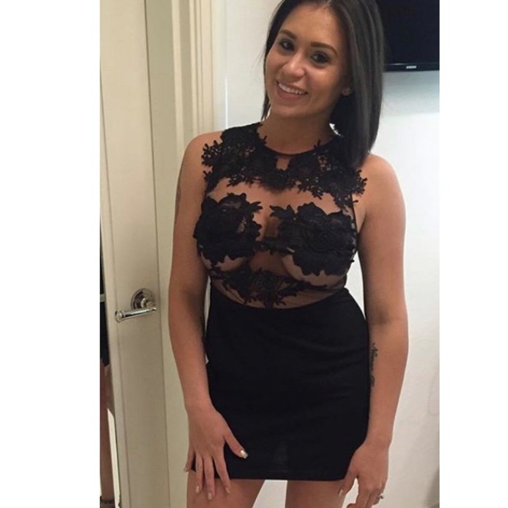 Black cocktail length dress